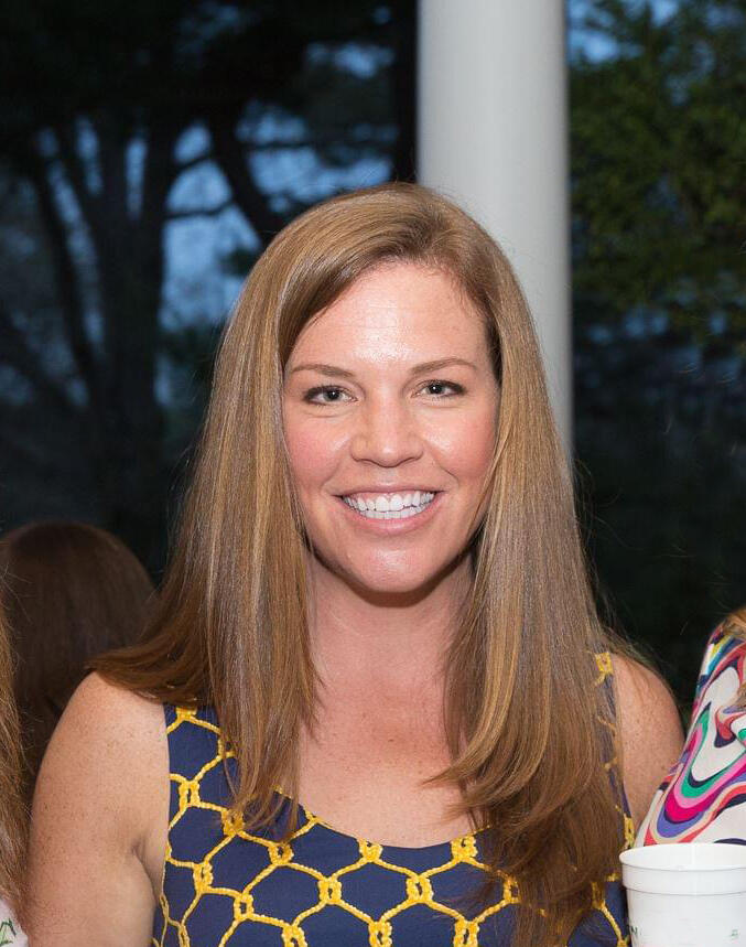Anne Litz in blue and gold patterned dress