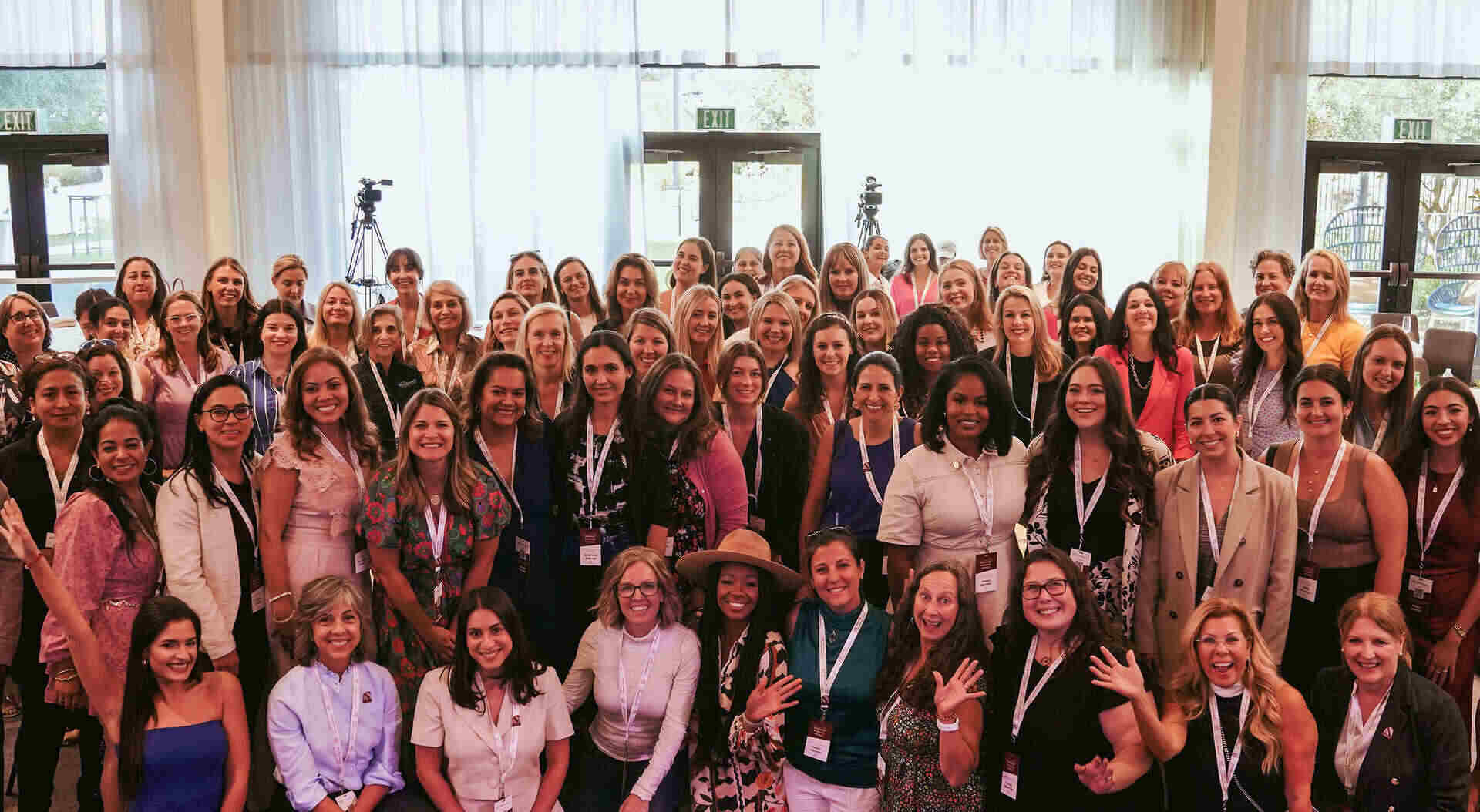 Large group of woman wearing lanyards