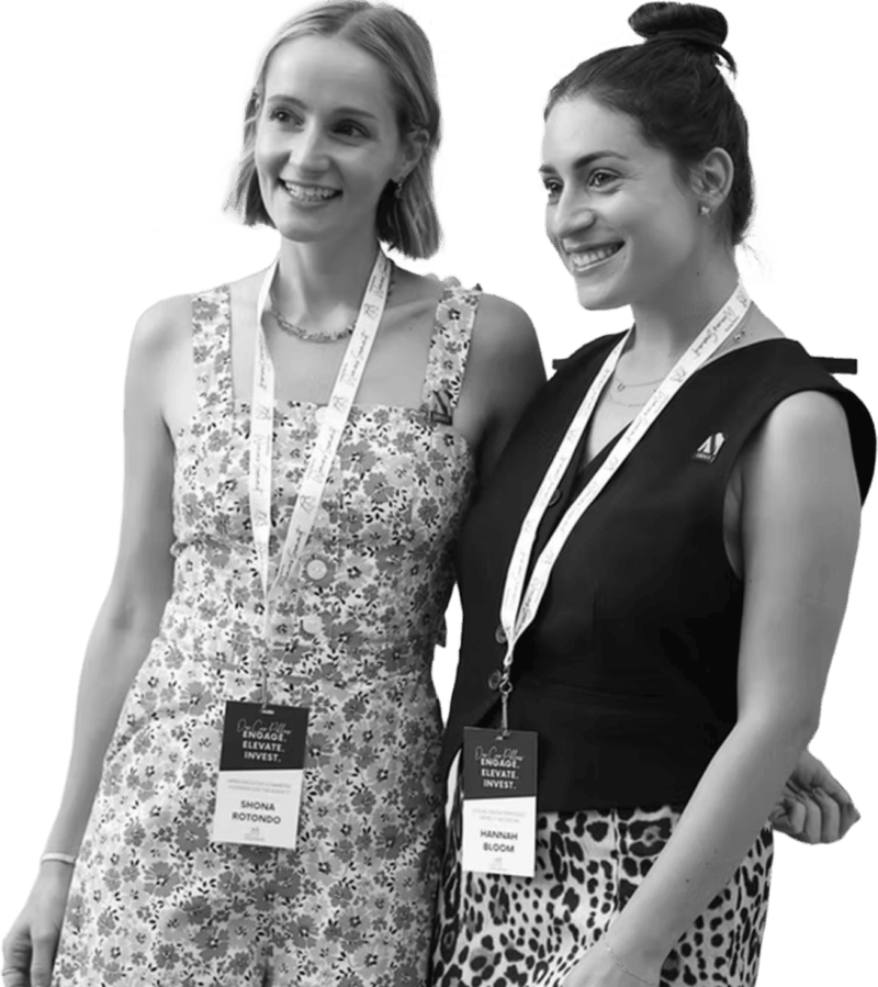 Two women with lanyards